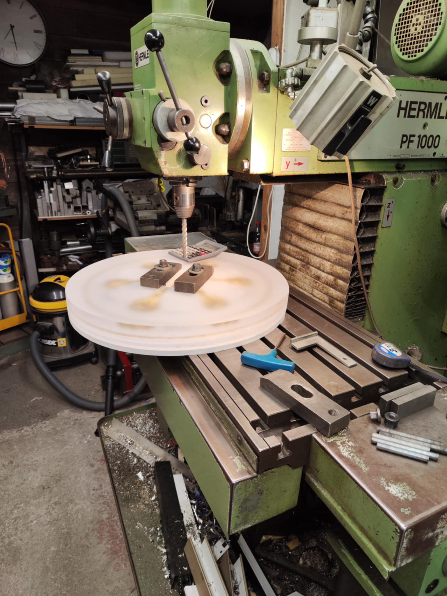The TABLEAU atelier — a Hermle PF 1000 mill cutting a cast resin table blank